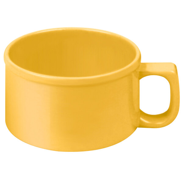 A yellow melamine soup mug with a handle.