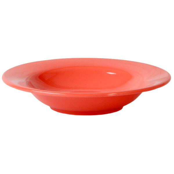 A close-up of a red Thunder Group melamine bowl with a wide rim.