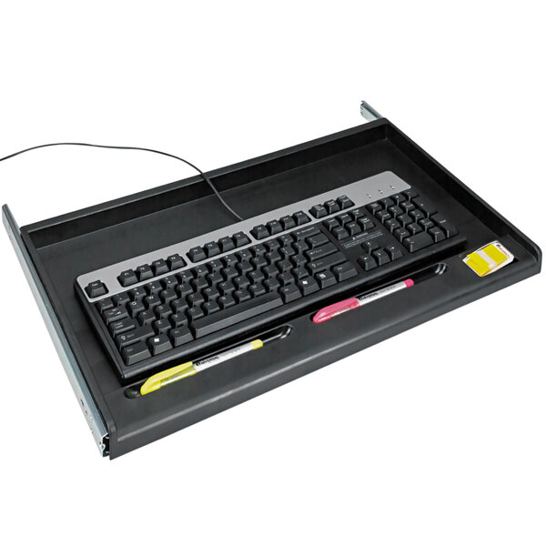 An Innovera black underdesk keyboard drawer with a pen holder.