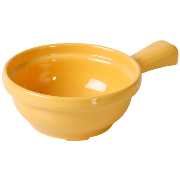 A yellow Thunder Group melamine soup bowl with a handle.