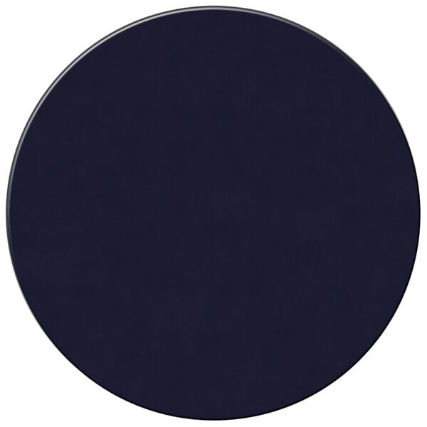 A dark blue round vinyl placemat with a white border.