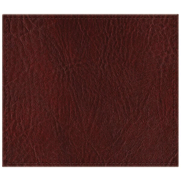 A white rectangular placemat with a brown leather texture.