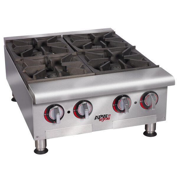 An APW Wyott stainless steel countertop range with four burners.