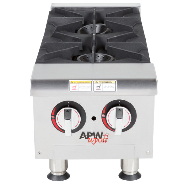 An APW Wyott liquid propane countertop range with two burners.