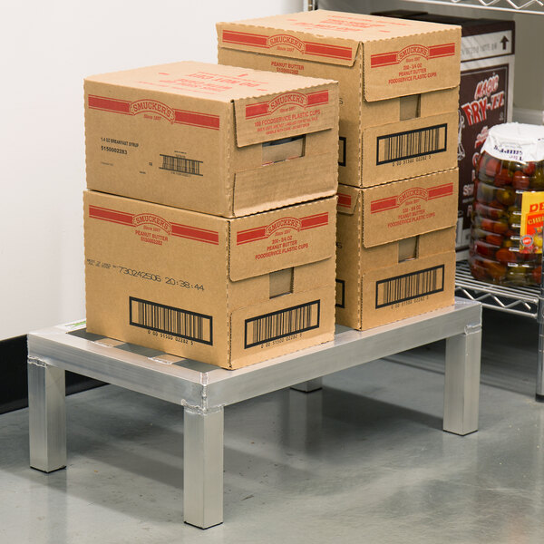 A stack of boxes on a Regency aluminum dunnage rack.