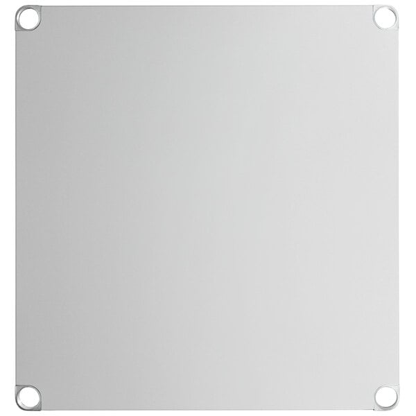A white metal square with metal rings on the corners.