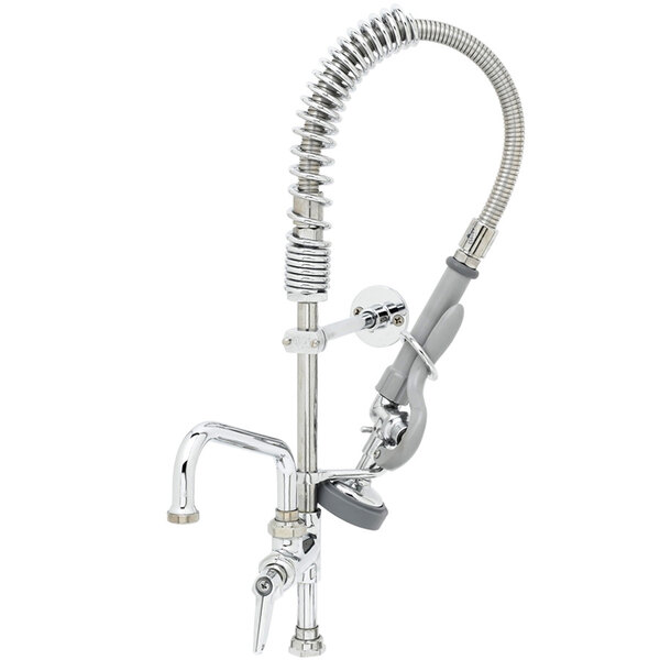 A chrome T&S pre-rinse faucet with a hose attached.