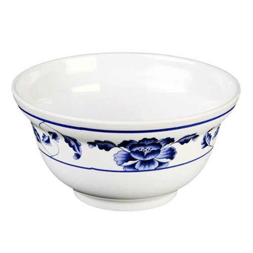A white melamine noodle bowl with blue lotus flowers on it.