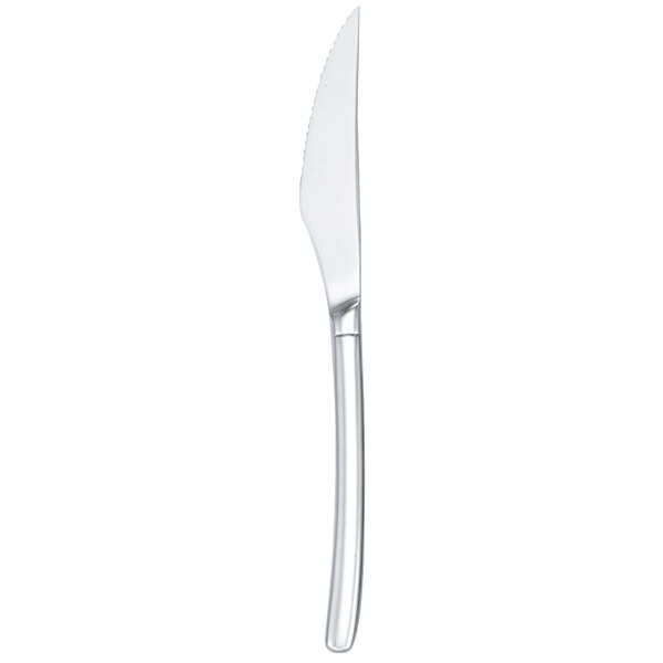 A silver Walco stainless steel steak knife with a solid handle.