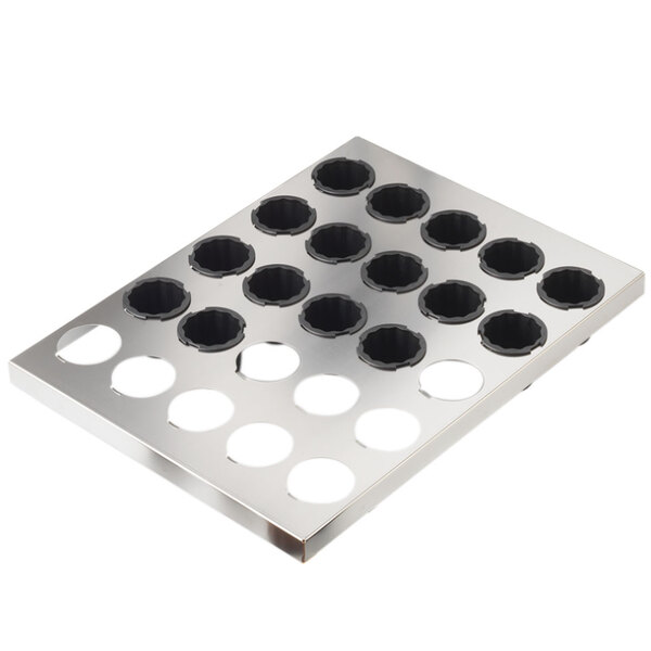 A silver Matfer Bourgeat metal tray with holes for 30 cannele molds.