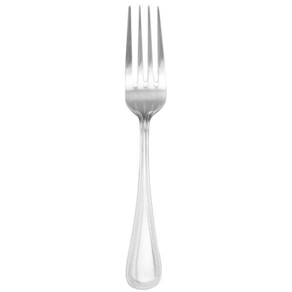 A close-up of a Walco stainless steel dinner fork with a silver handle.