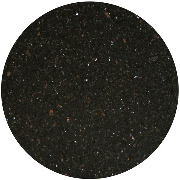 An Art Marble Furniture round black galaxy granite table top with white specks on a black speckled surface.