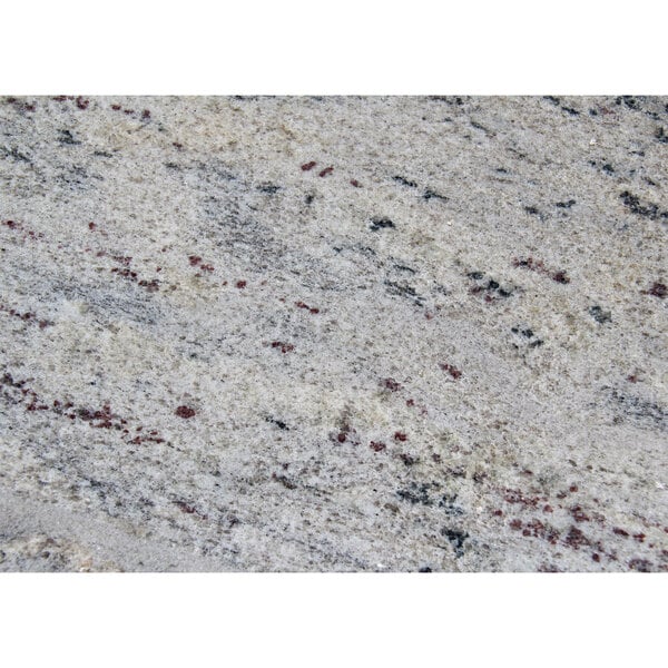 A close up of a Kashmir white granite tabletop.