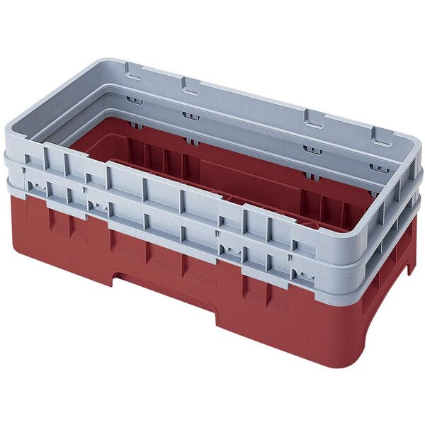 A red and grey plastic container with two compartments for Cambro dish racks.