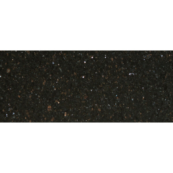 A close-up of a black granite table top with black and white speckles.