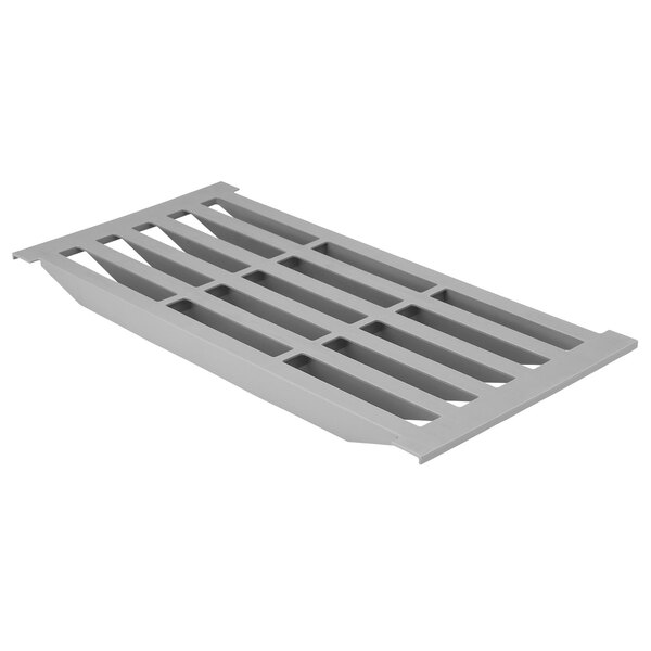 A grey plastic grate with holes.