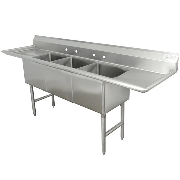 An Advance Tabco stainless steel commercial sink with three compartments and two drainboards.