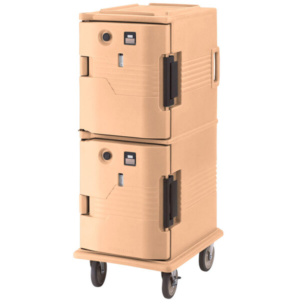 A tan Cambro Ultra Camcart food holding cabinet on wheels.