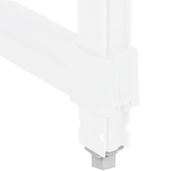 A white plastic leveling foot with a metal clip.