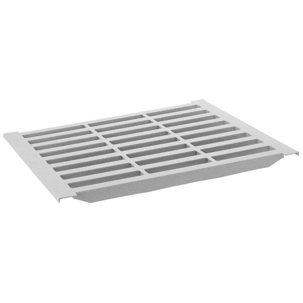 A white plastic grate with holes.