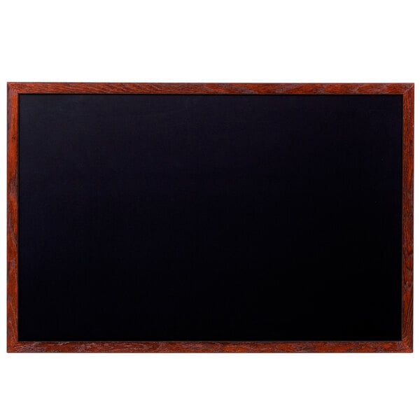A mahogany-framed black chalk board.