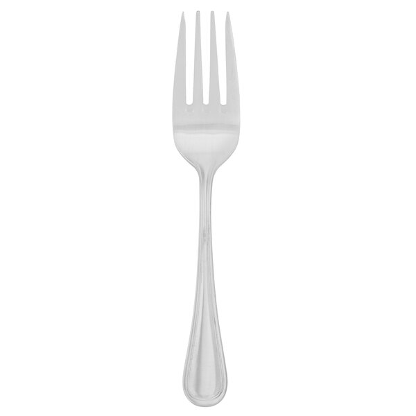 A silver Walco Napa salad fork with a white background.