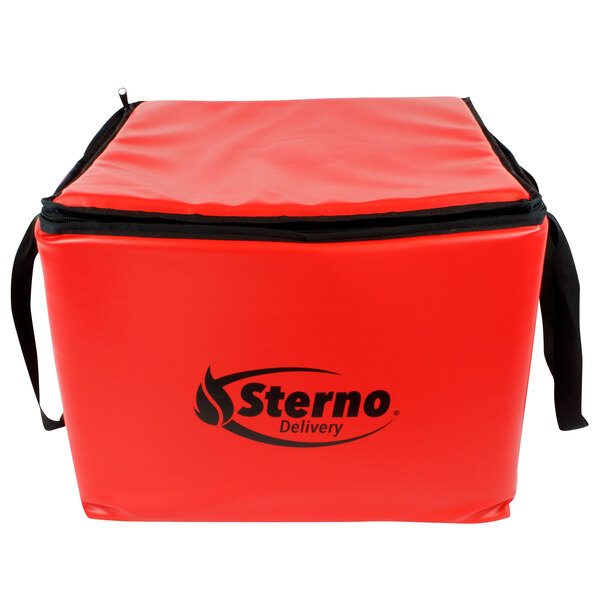 A red Sterno insulated food carrier with black handles and black text.