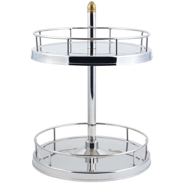 A silver metal Bon Chef revolving stand with a round glass bottom.