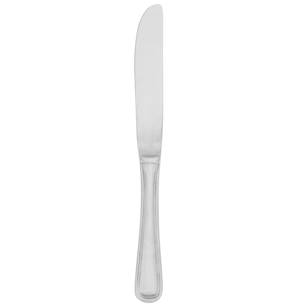 A silver knife with a black edge and a white handle.