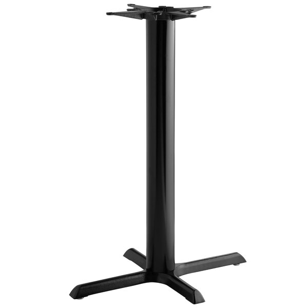 A Lancaster Table & Seating black cast iron bar height table base with a pedestal column.