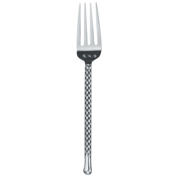A Walco stainless steel dinner fork with a checkered silver handle.