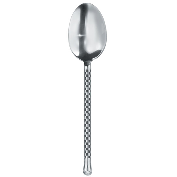 A Walco stainless steel dessert spoon with a checkered handle.