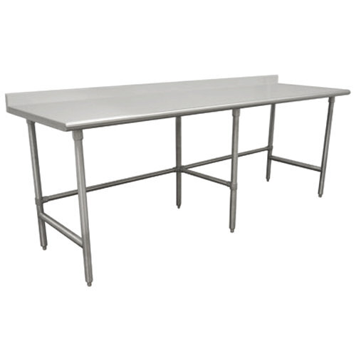 An Advance Tabco stainless steel work table with an open base and a white surface.