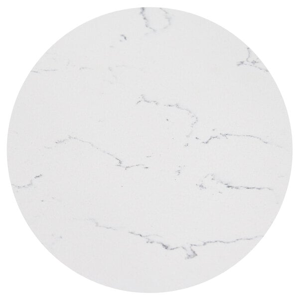 A close-up of an Art Marble Furniture Carrera White Quartz Tabletop with black veins.