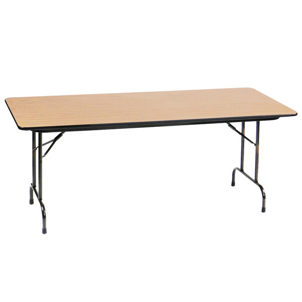 A rectangular Correll folding table with a wooden top and black legs.