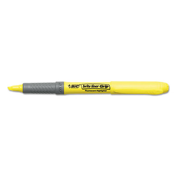 A yellow Bic Brite Liner highlighter pen with a black grip and tip.