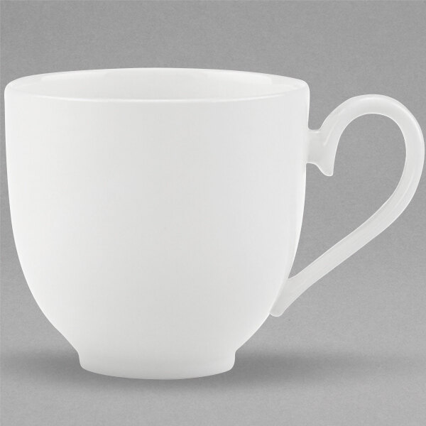 A Villeroy & Boch white bone porcelain cup with a handle.