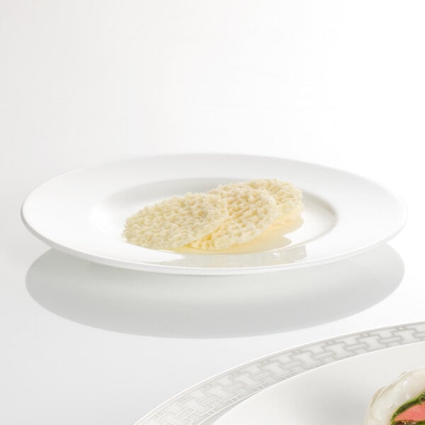 A white Villeroy & Boch bone porcelain plate with food on it.