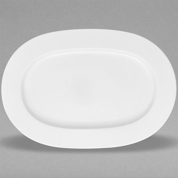 A white Villeroy & Boch bone porcelain oval plate with an oval edge.