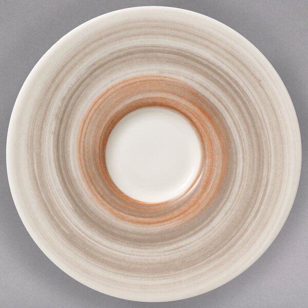 A close up of a Villeroy & Boch taupe porcelain saucer with a white center and brown rim.