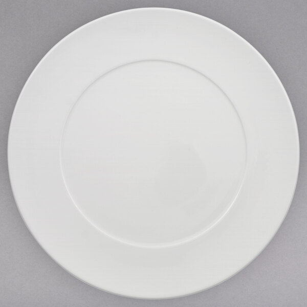 A white porcelain plate with a white rim.