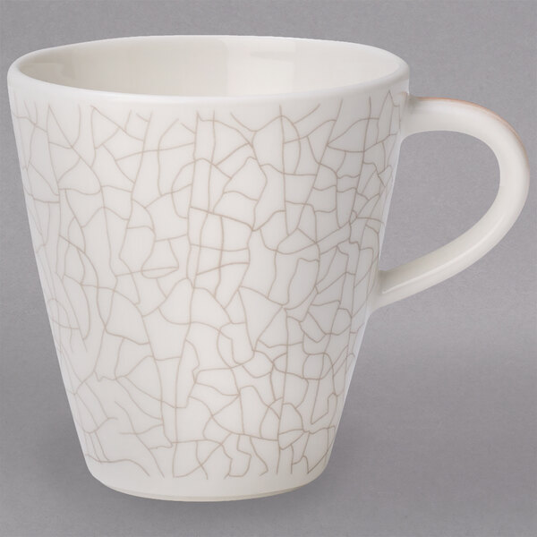 A white Villeroy & Boch porcelain espresso cup with a crackle pattern.
