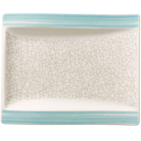 A white rectangular Villeroy & Boch porcelain plate with a blue design.