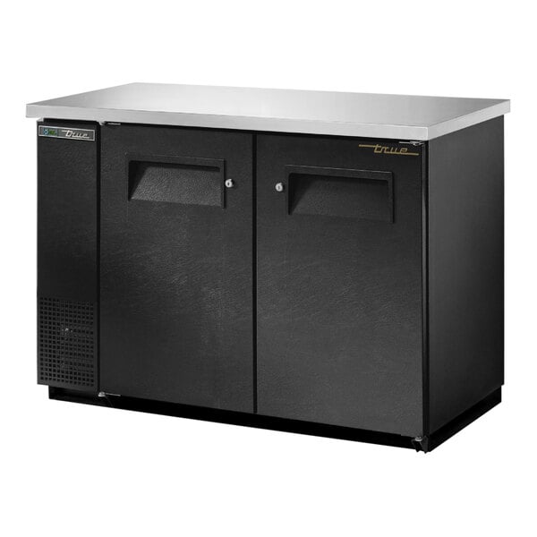 A True black back bar refrigerator with two doors.