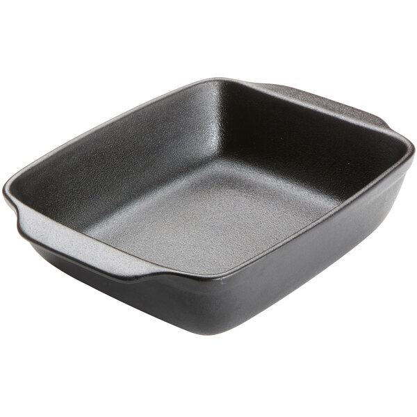 An American Metalcraft black rectangular porcelain casserole dish with handles.