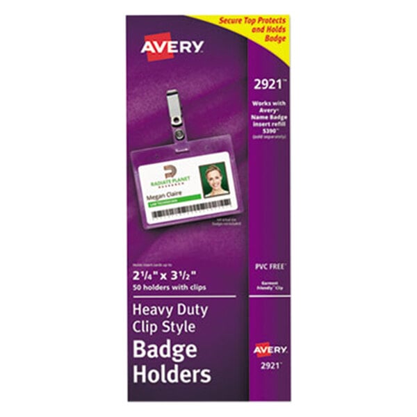 A purple rectangular box with a white label and a green label on Avery clip-style badge holders.