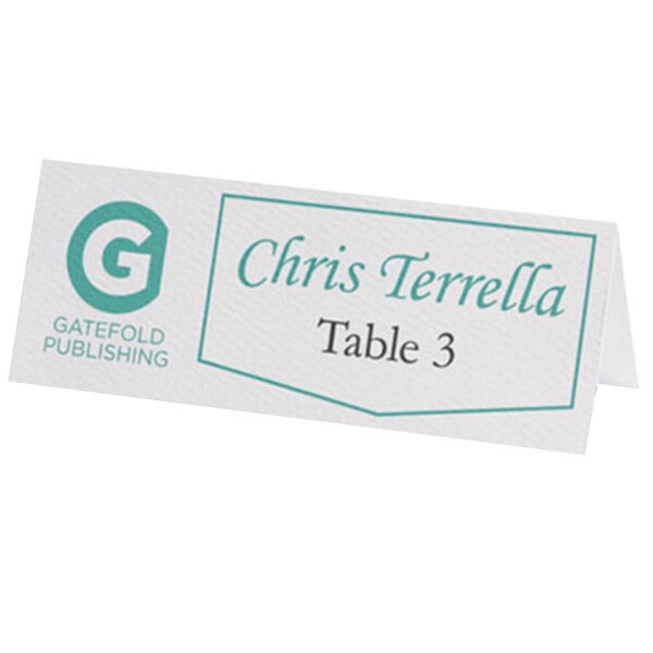 A white table tent card with black text that says "Chris Terrell"