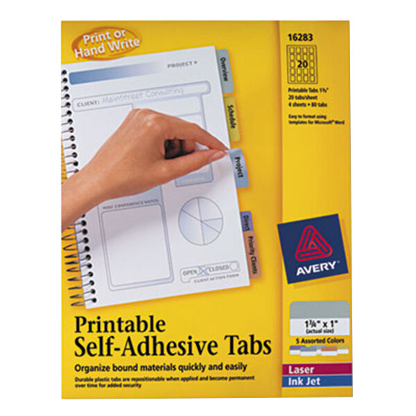 A hand holding a piece of paper with Avery® self-adhesive tabs.