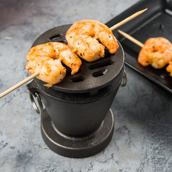 Shrimp skewers on a Town Hibachi grill.