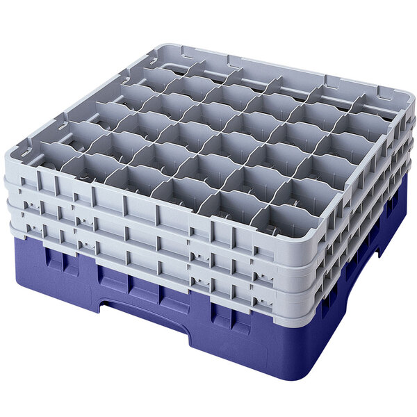 A navy blue plastic Cambro Camrack with 36 compartments and 5 extenders.